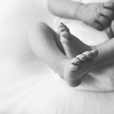 Newborn baby photography photoshoot. Baby feet. Photographer of photo shoot is Cheryl Catton , Woking.