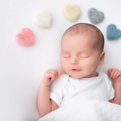 Newborn baby photography photoshoot. Cute baby. Photographer of photo shoot is Cheryl Catton , Woking.