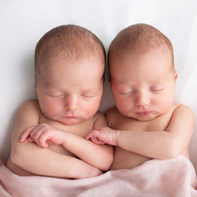 Twin Newborn baby photography photoshoot. Cute baby. Photographer of photo shoot is Cheryl Catton , Woking.