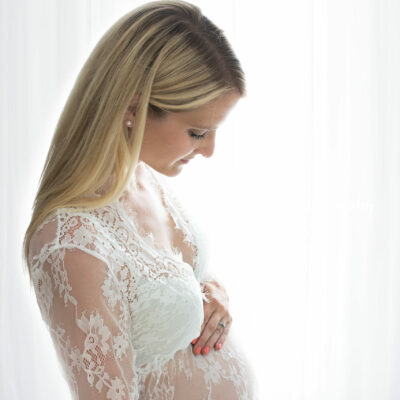 Maternity photoshoot. Mum-to-be and bump. Photographer Cheryl Catton at home studio in Woking.