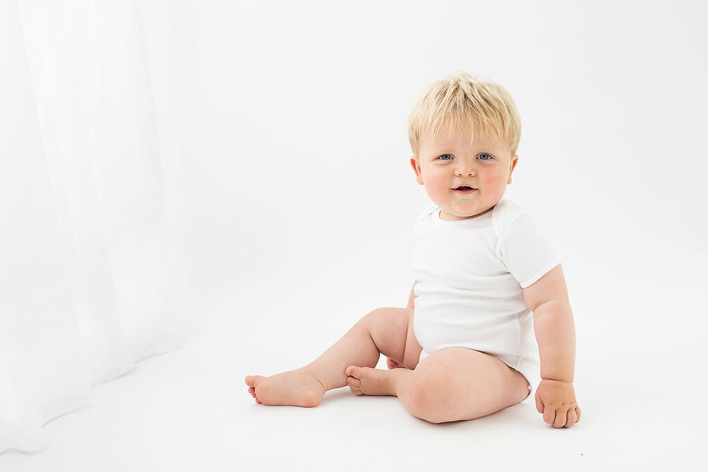 Sitter photoshoot. Toddler photography in Woking home studio. Photo shoot by Cheryl Catton.